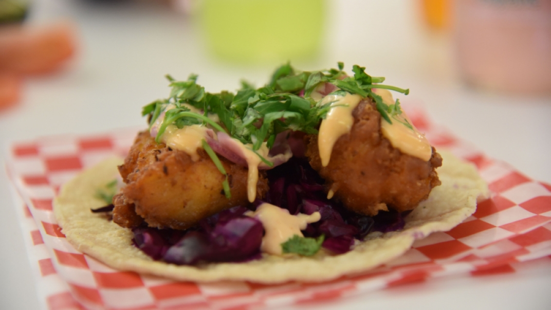 open face taco on checkered parchment paper