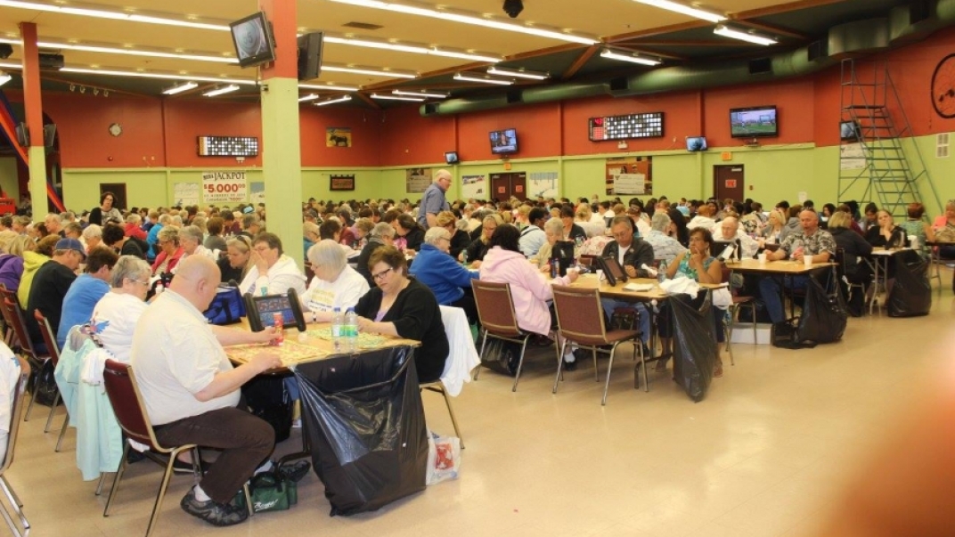Room of elderly people playing bingo