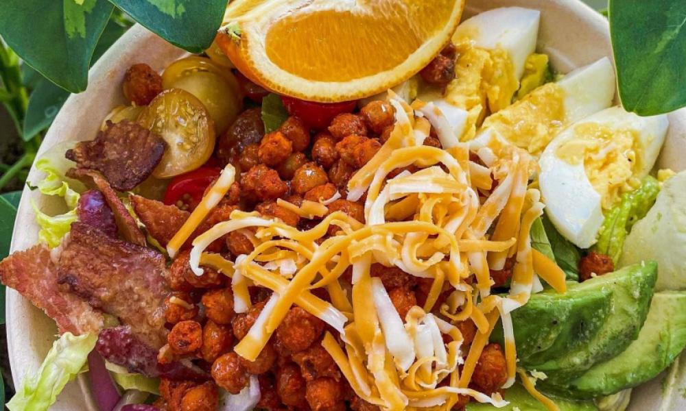 cobb salad with bacon, cheese, egg and avocado