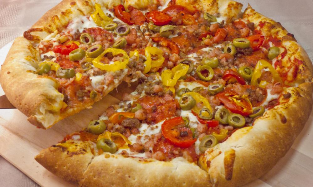 pizza with golden crust and various toppings